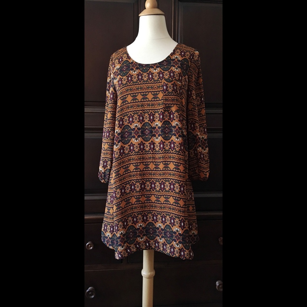 Rust colored geometric print shift dress